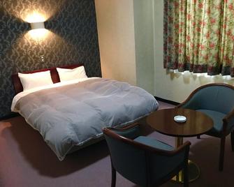 Hotel Nakajima - Саку - Спальня