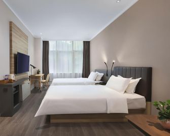 Hanting Premium Hotel Nanjing Longjiang Jiangdongbei Road - Nanjing - Bedroom