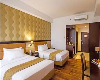 Beston Hotel Palembang - Palembang - Habitación