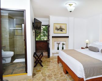 La Campana Hotel Boutique - מדיין - חדר שינה