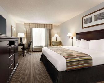 Country Inn & Suites by Radisson, Kingsland, GA - Kingsland - Κρεβατοκάμαρα