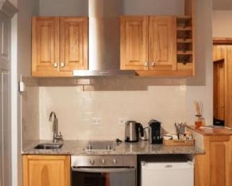 Las Bayas Home Suites - Esquel - Cozinha