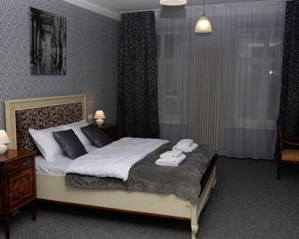 Lvivde Hostel - لفيف - غرفة نوم