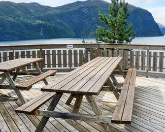 10 person holiday home in Stordal - Stordal - Balcony