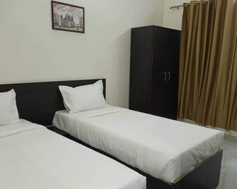 Hotel Citymax Inn - Greater Noida - Schlafzimmer