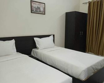 Hotel Citymax Inn - Greater Noida - Schlafzimmer