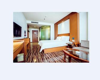 Goldmet Inn Taiyuan Dananamen - Taiyuan - Κρεβατοκάμαρα