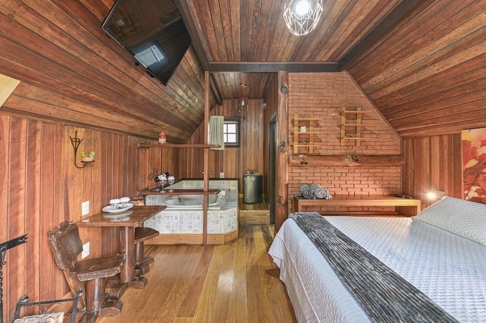 Pousada Cantos e Contos - Monte Verde - חדר שינה