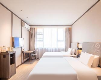 Hanting Hotel Puyang Huanghe Road - Puyang - Habitación