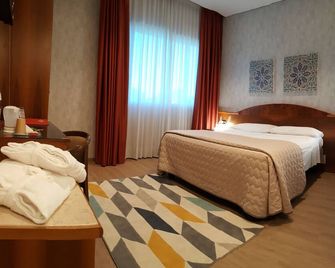 Hotel Poppi - Mira - Slaapkamer