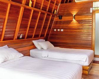 Torau Resort - Tentena - Schlafzimmer
