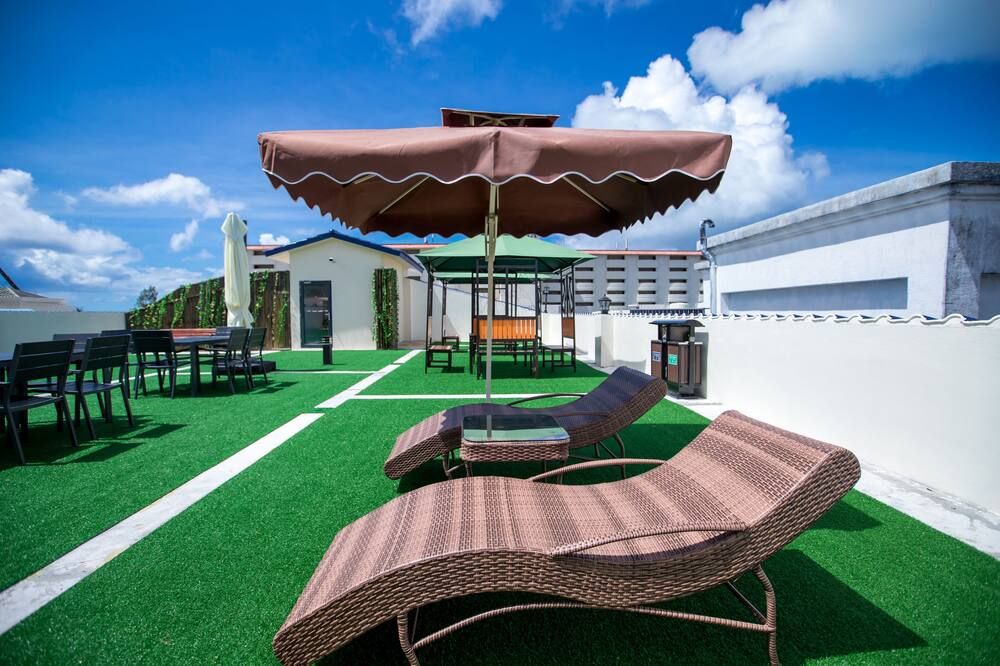 هوتل أميريكانو - Garapan - شرفة مرصوفة