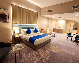 Best Western Premier M Four Hotel - Dubai - Schlafzimmer