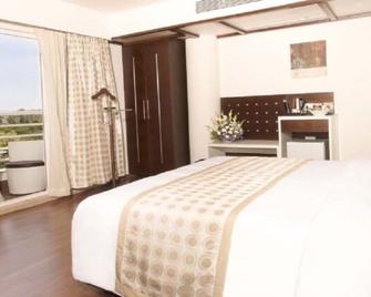 The President Hotel - Hubli - Bedroom