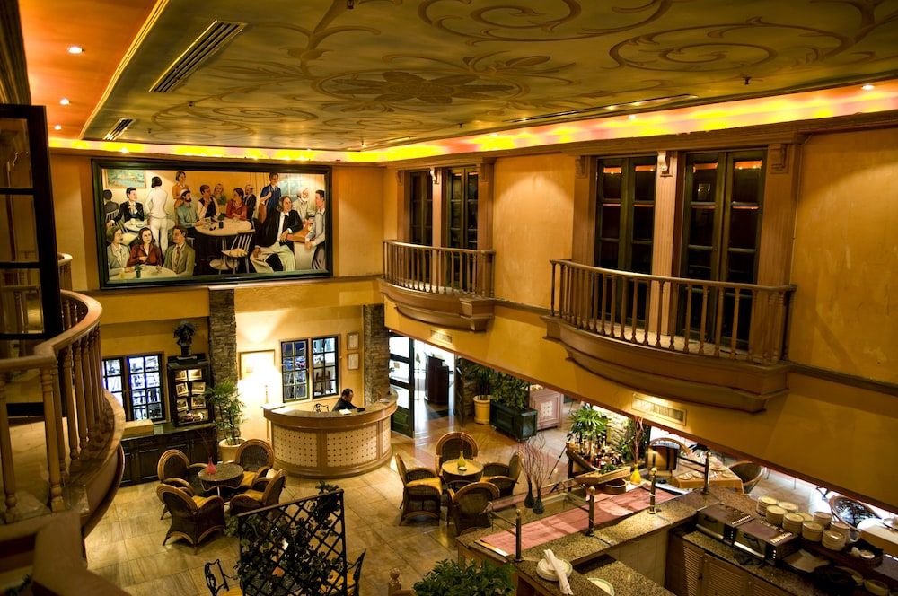 Merdeka Palace Hotel & Suites - קוצ'ינג - מסעדה