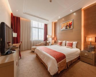 Golden Phoenix Hotel - Taizhou - Schlafzimmer