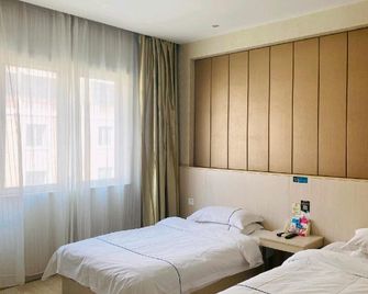 Xuancheng Guangde Wanjia Express Inn - Xuancheng - Camera da letto