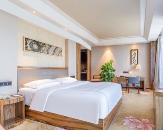 Inzone Garland Hotel Jiaxiang - Jining - Bedroom