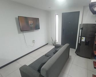 Suite apartment - Loja - Living room