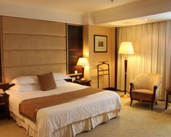 New Century Hotel Taizhou - Taizhou - Bedroom