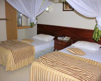 Holiday Express Hotel - Καμπάλα - Κρεβατοκάμαρα