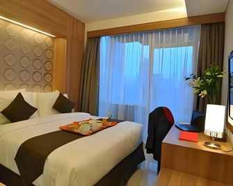 d'primahotel Mega Kuningan - ג'קרטה - חדר שינה