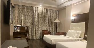 Hotel Heritage Inn - Coimbatore - Bedroom