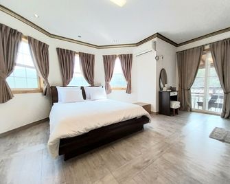 Another world pension - Gyeongju - Bedroom