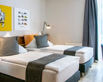 Impulsiv Hotel & Sportresort - Lörrach - Bedroom