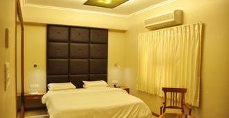Hotel Aram - Jamnagar - Bedroom