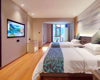 Topfort Hotel - Tongren - Habitación