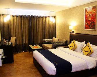 Vista Rooms at Nandan Kanan - Dewas - Bedroom