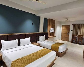 Hotel Beverly Plaza Kozhikode - Kozhikode - Bedroom