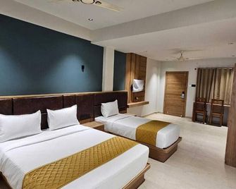 Hotel Beverly Plaza Kozhikode - Kozhikode - Habitación