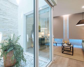 Sercotel Sevilla Guadalquivir Suites - Sevilla - Schlafzimmer