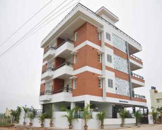 Orange Suites Airport Transit Stay - Bengaluru - Building