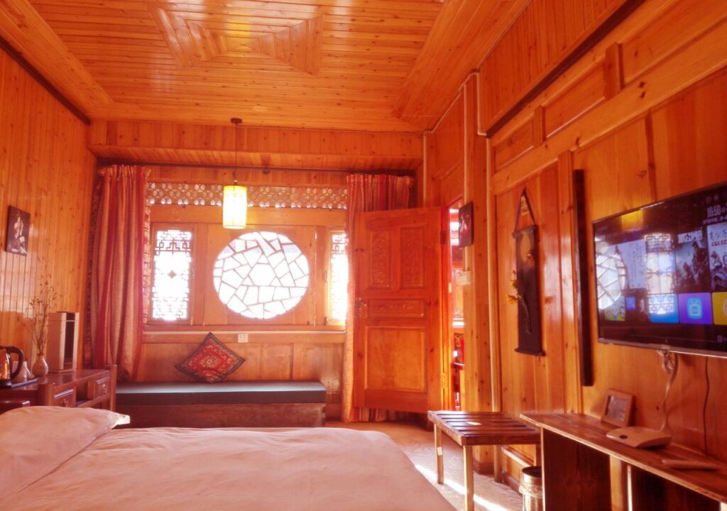 Lijiang Xianyun Xiaozhu Inn - ליז'יאנג - חדר שינה