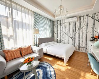 Time Machine Hotel - Leshan - Camera da letto
