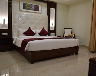 Star Palace Hotel - Rameswaram - Schlafzimmer