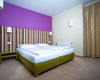 Bauernwirt - غراتس - غرفة نوم