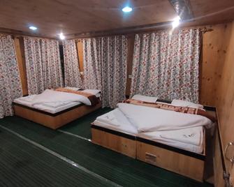 Hotel Mehak Pahalgam - Pahalgam - Спальня