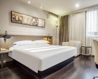 Jinjiang Inn Select Zhenjiang Wanda Plaza Xijindu - Zhenjiang - Camera da letto