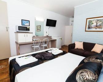 Toolooa Gardens Motel and Apartments - Gladstone - Bedroom