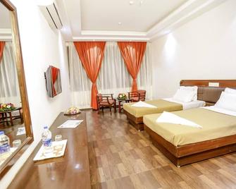 Hotel Trupti International Hubli - Hubli - Ložnice