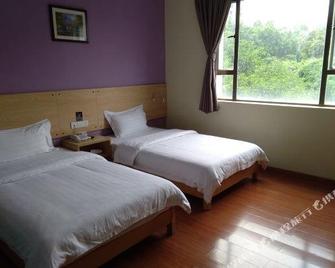 Rujia Business Hotel (Zhanjiang Aihua Plaza) - Zhanjiang - Slaapkamer