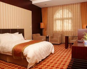 China Garden Hotel - Suzhou - Schlafzimmer