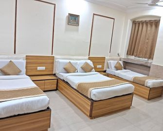 Hotel Swapna International - מומבאי - חדר שינה