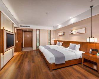 Lifeng Hotel (Chongqing Jiangbei International Airport) - Tsjoengking - Slaapkamer
