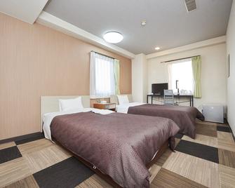 Hotel Select Inn Utsunomiya - Utsunomiya - Schlafzimmer