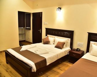 Sak Royal Residency - Mysore - Bedroom